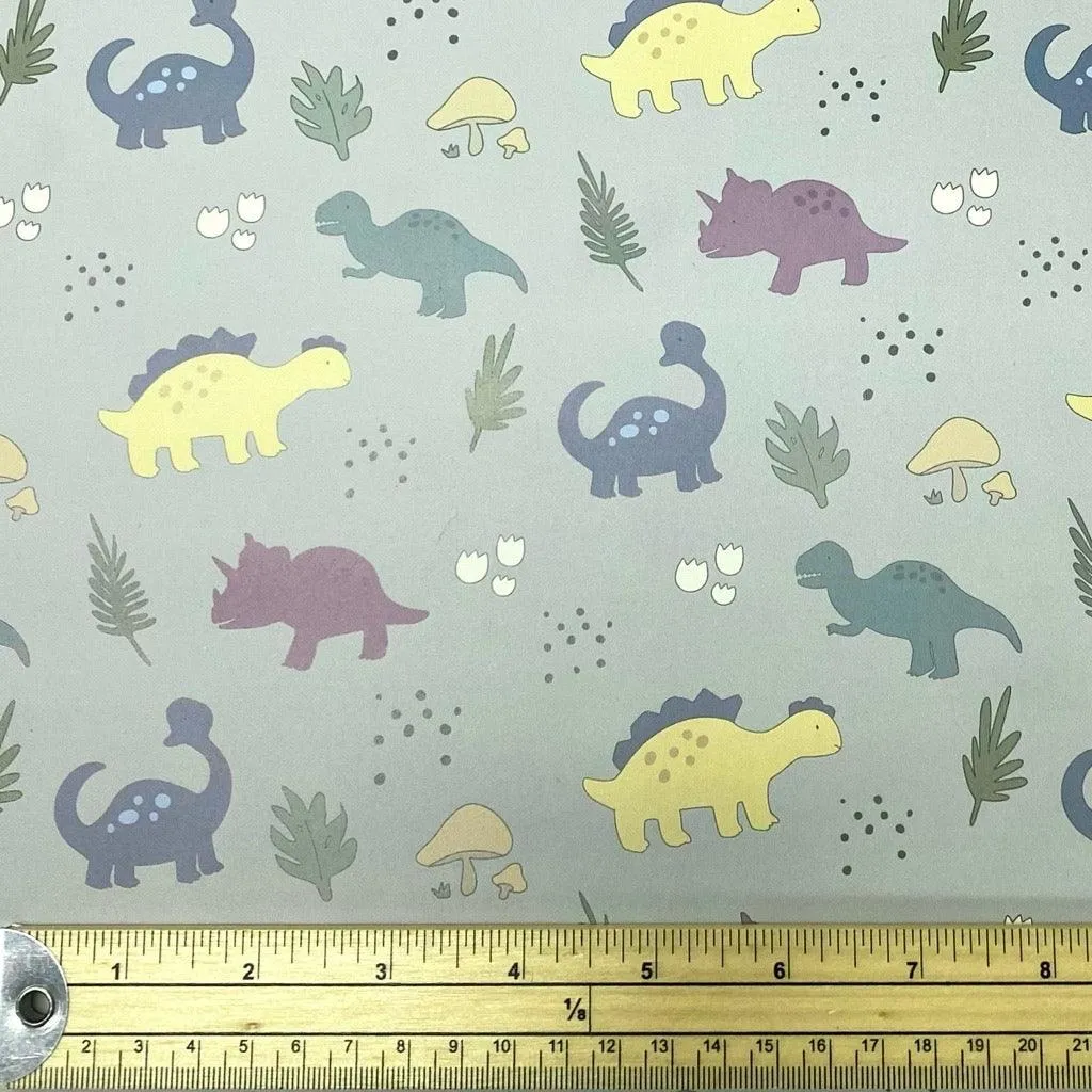 Dinosaurs on Pale Green Raincoat Fabric